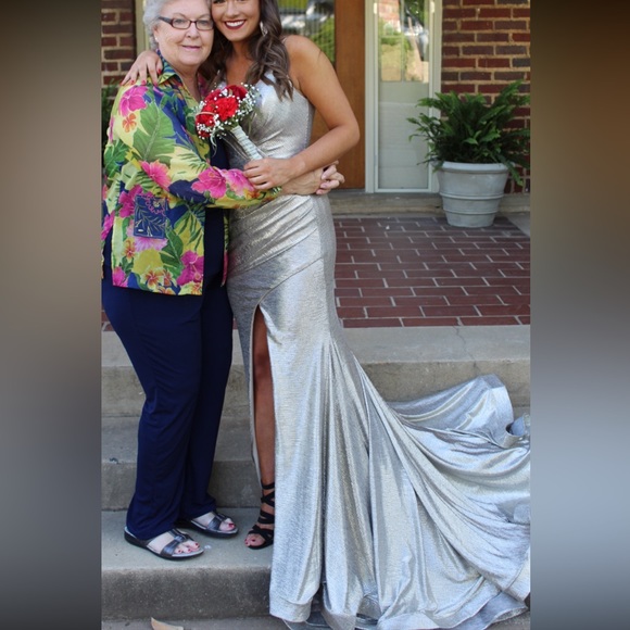 Jovani Dresses & Skirts - Jovani Silver/Goldish Dress with long, beautiful train